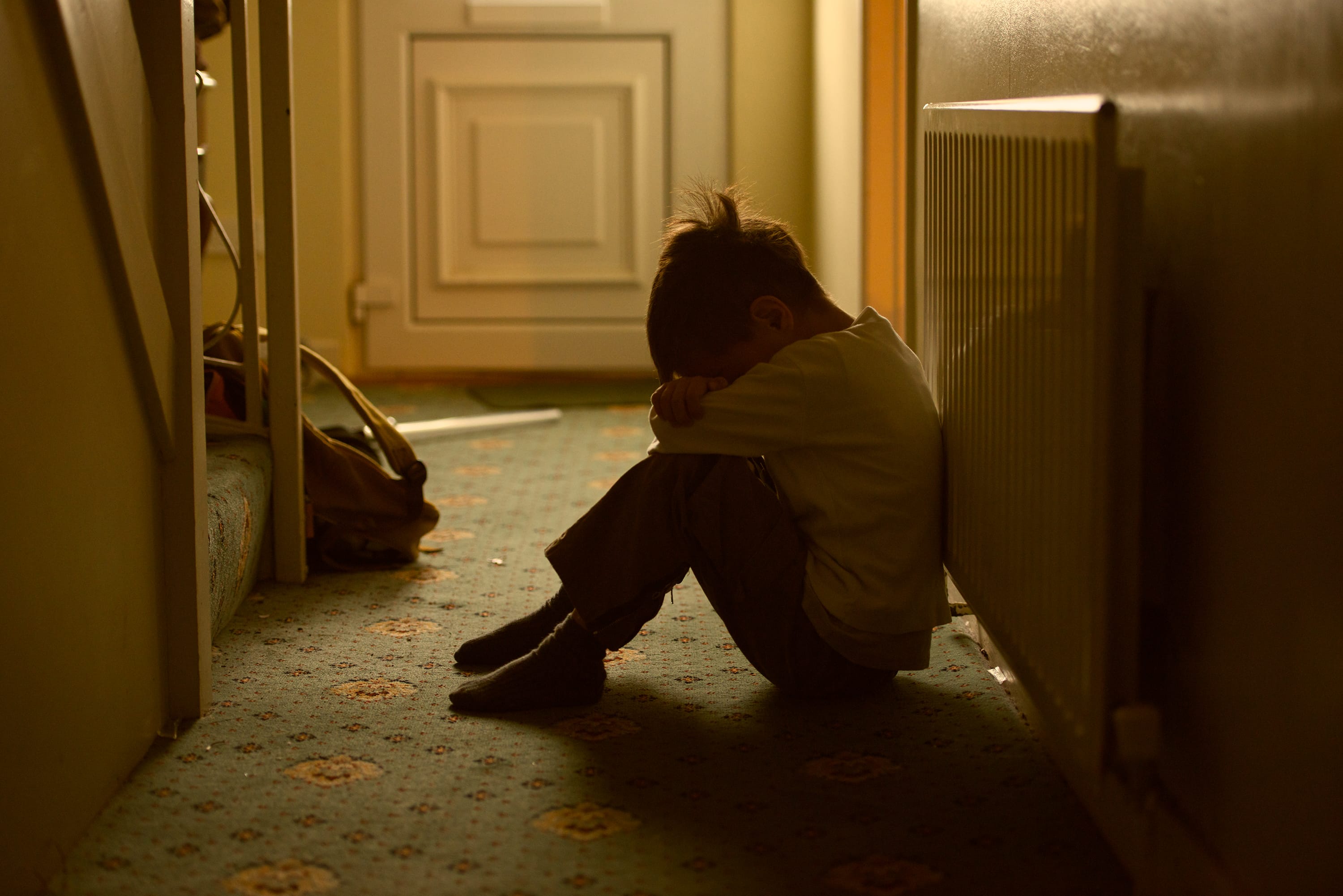 Photo of a young boy crying